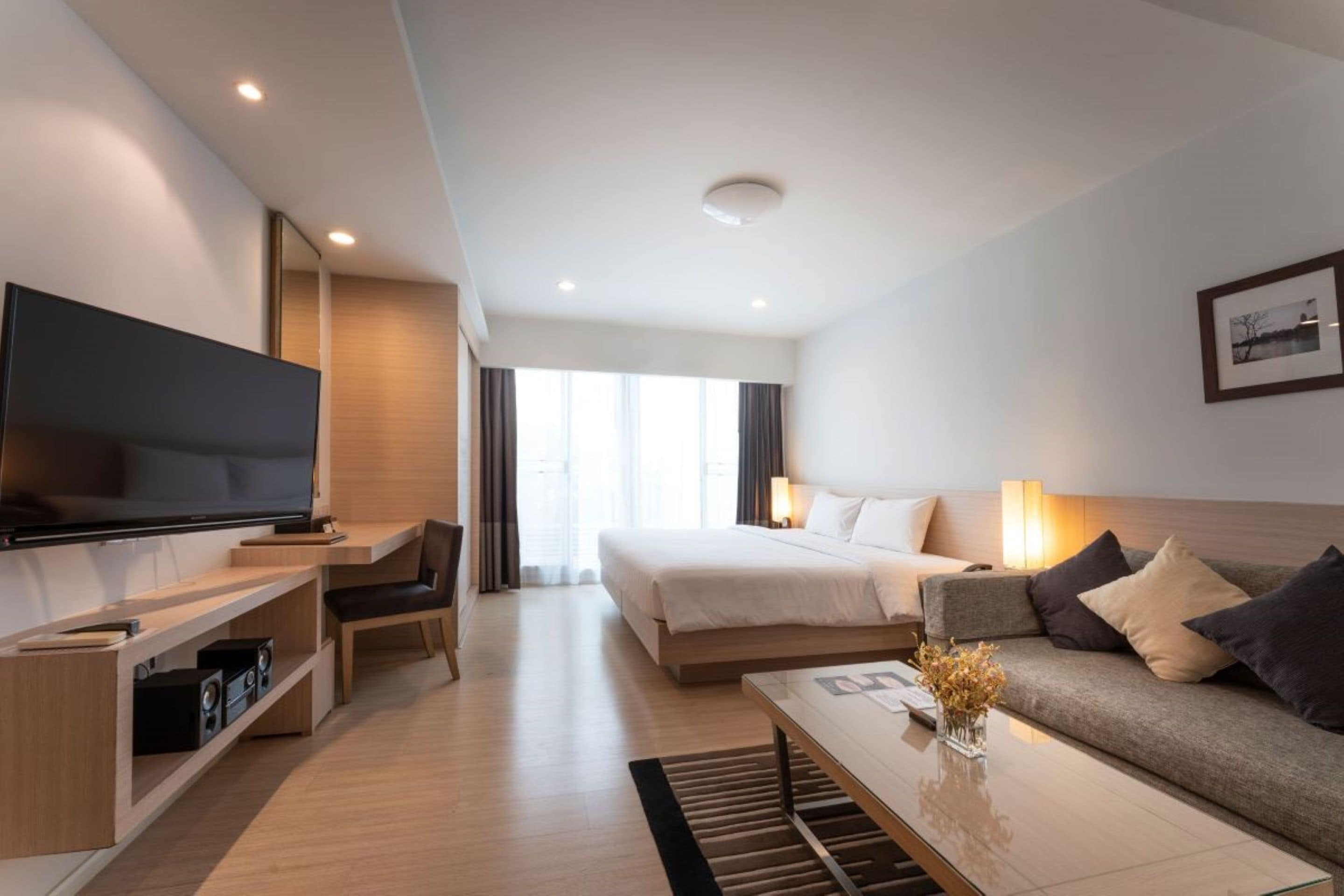 Studio Suite | Living area | 32-inch LCD TV with satellite channels, TV, DVD player