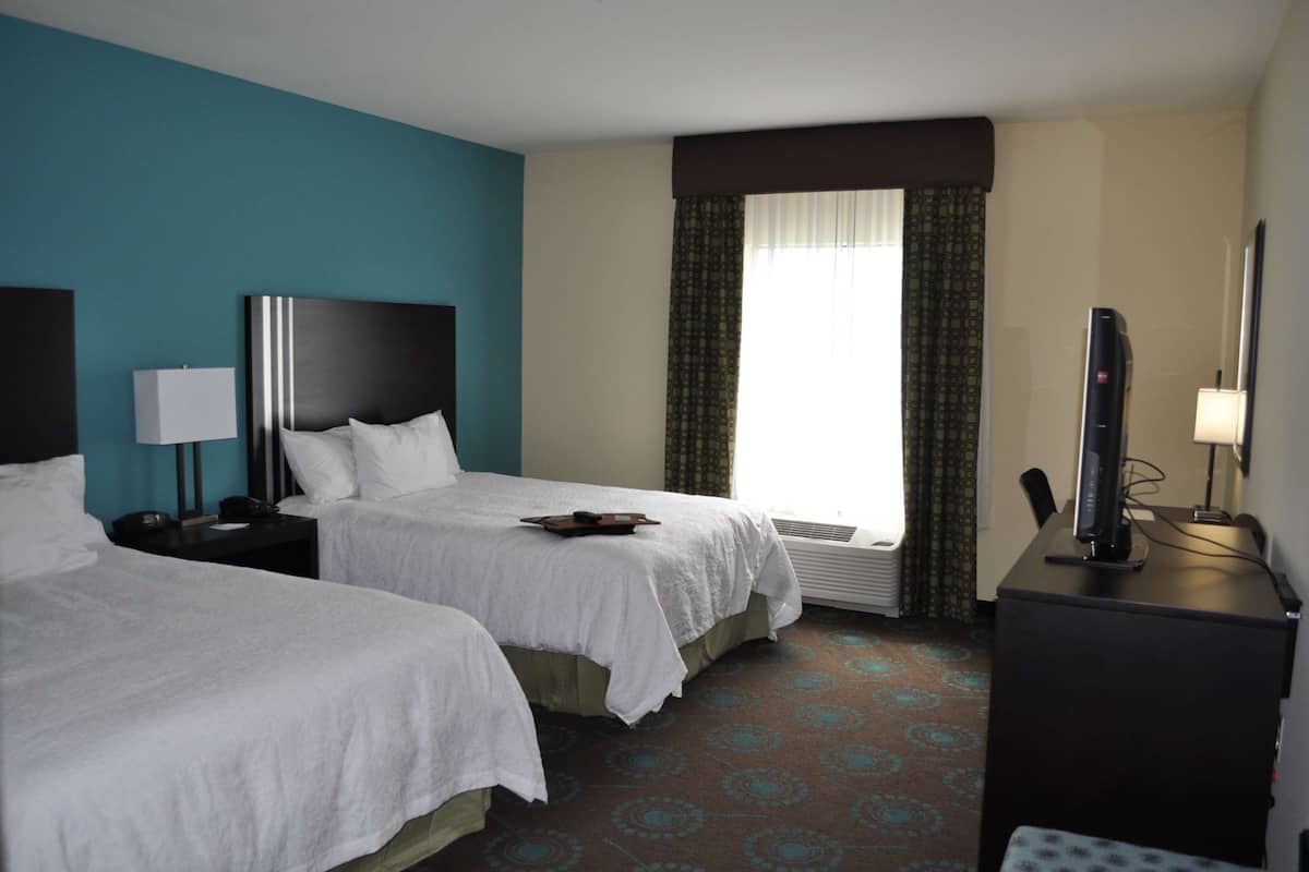 Room, 2 Queen Beds | In-room safe, desk, iron/ironing board, cribs/infant beds