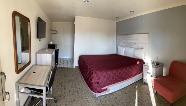 Standard Room, 1 King Bed, Non Smoking | Desk, blackout curtains, iron/ironing board, free WiFi