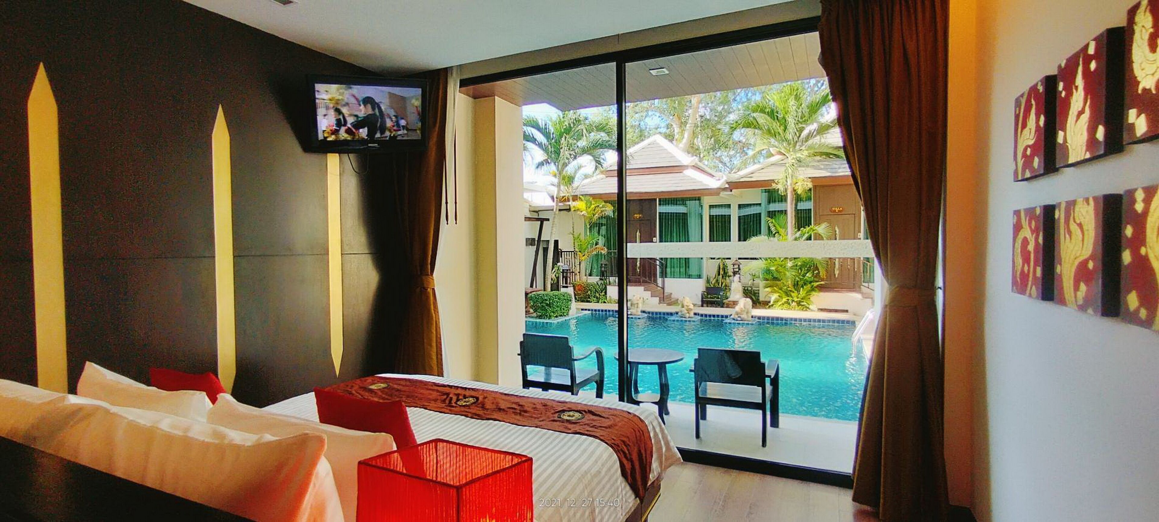 Junior Suite, Pool Access | Minibar, in-room safe, desk, free WiFi