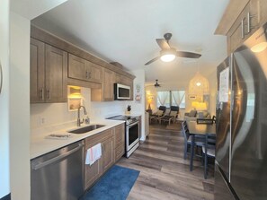 Comfort Condo, Garden View | Private kitchen | Fridge, microwave, coffee/tea maker, electric kettle - Palm Tree Villas (Holmes Beach)