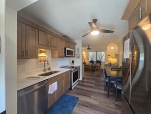 Comfort Condo, Garden View | Private kitchen | Fridge, microwave, coffee/tea maker, electric kettle - Palm Tree Villas (Holmes Beach)