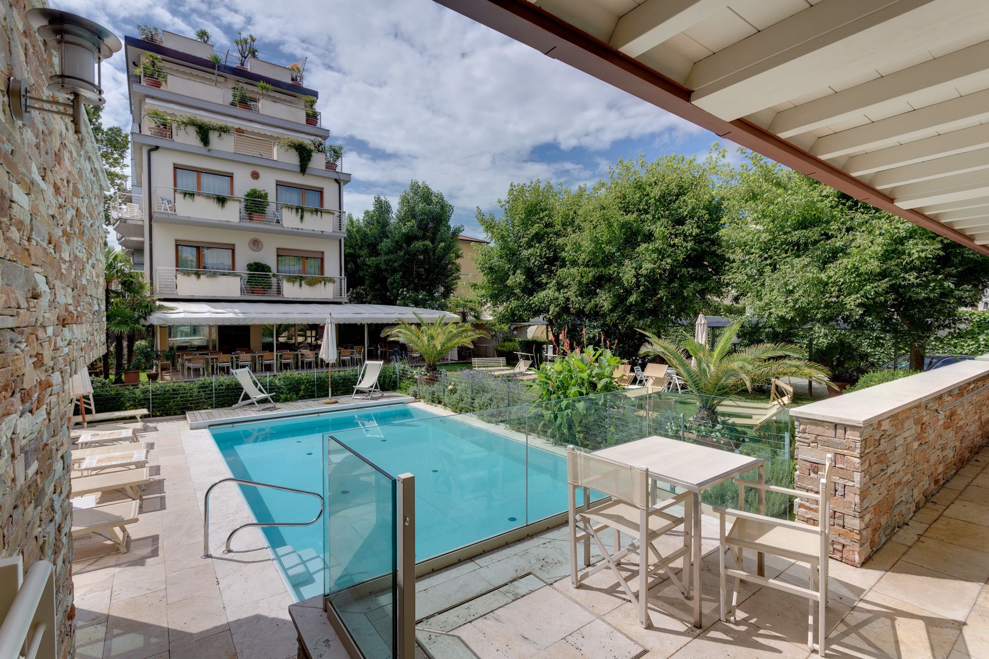 Outdoor pool, a lap pool, open 8:00 AM to 7:30 PM, sun loungers