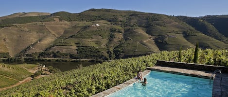 Seasonal outdoor pool, pool loungers