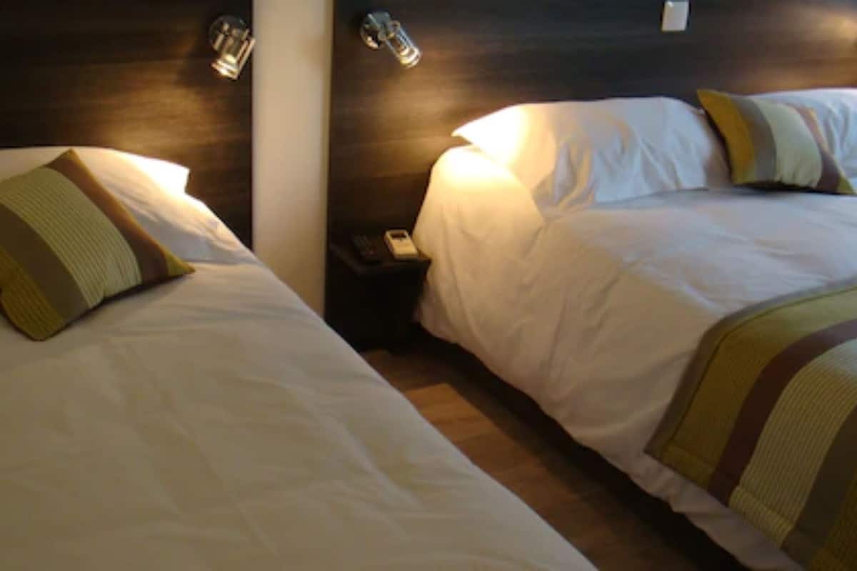 comfort triple room | desk, blackout curtains, soundproofing, iron/ironing board