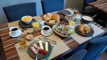 Daily buffet breakfast (EUR 8 per person)