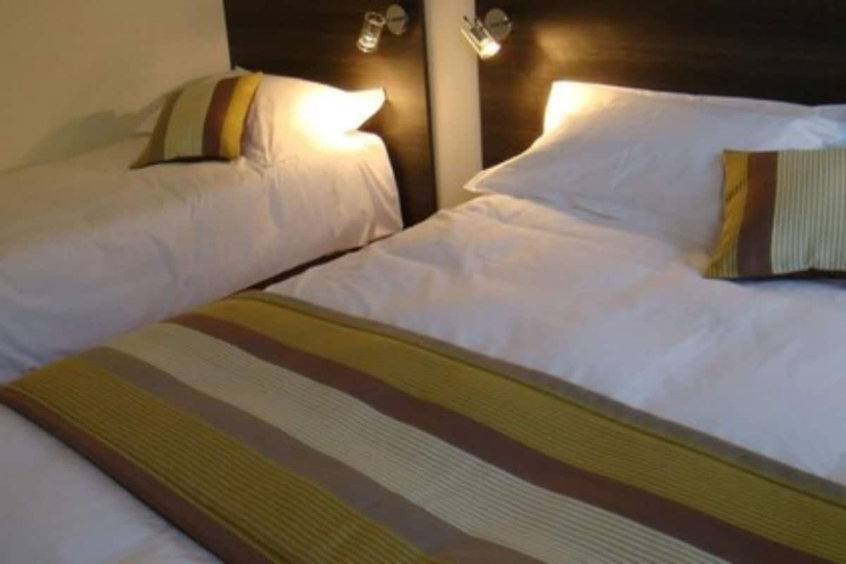 comfort triple room | desk, blackout curtains, soundproofing, iron/ironing board