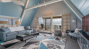 Beach House Suite (2nd floor, stair access only) | Living area | 42-inch flat-screen TV with cable channels, TV