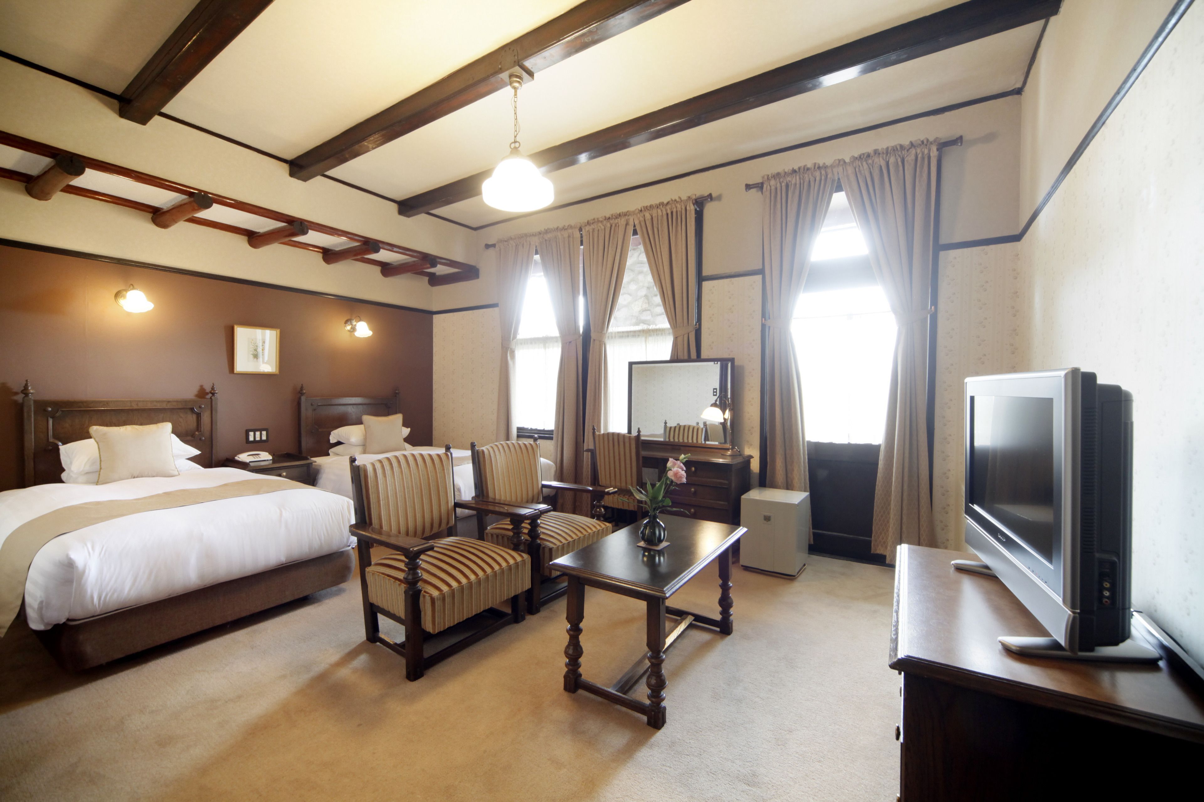 deluxe twin room | premium bedding, in-room safe, desk, blackout curtains