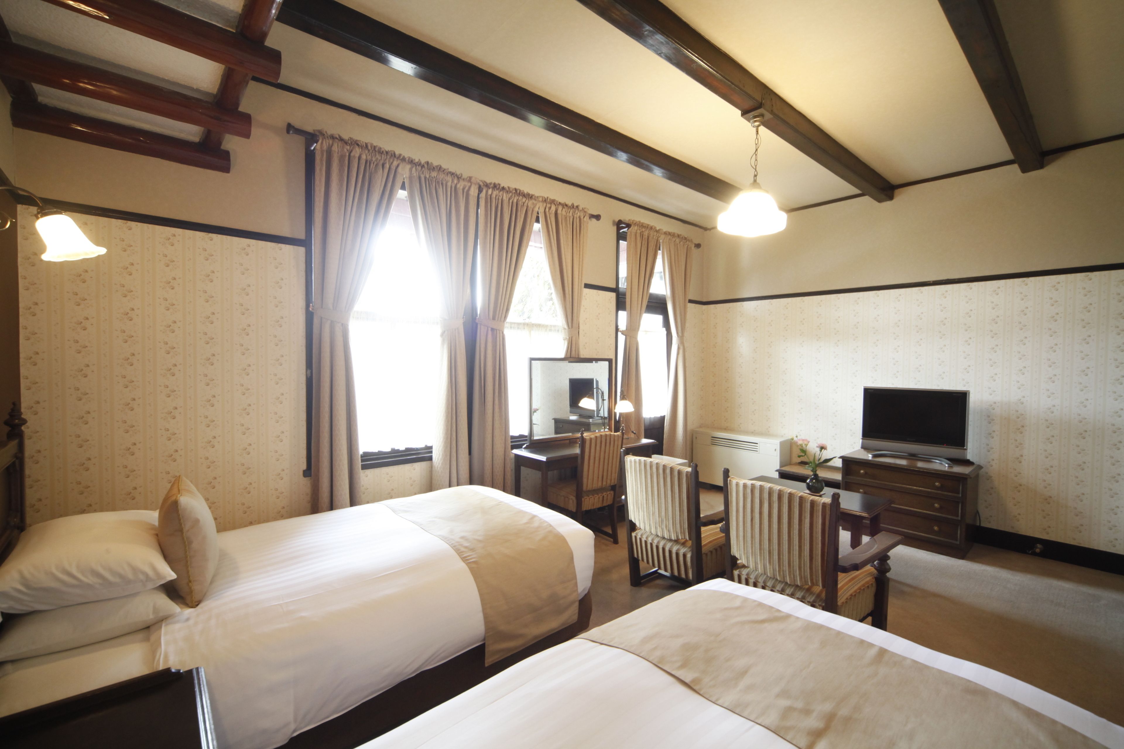 deluxe twin room | premium bedding, in-room safe, desk, blackout curtains