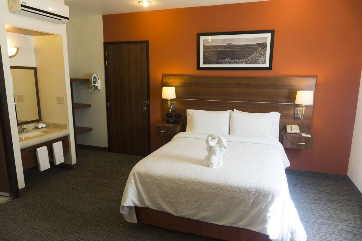 Egyptian cotton sheets, premium bedding, down comforters, in-room safe