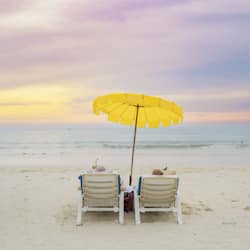 On the beach, white sand, beach towels