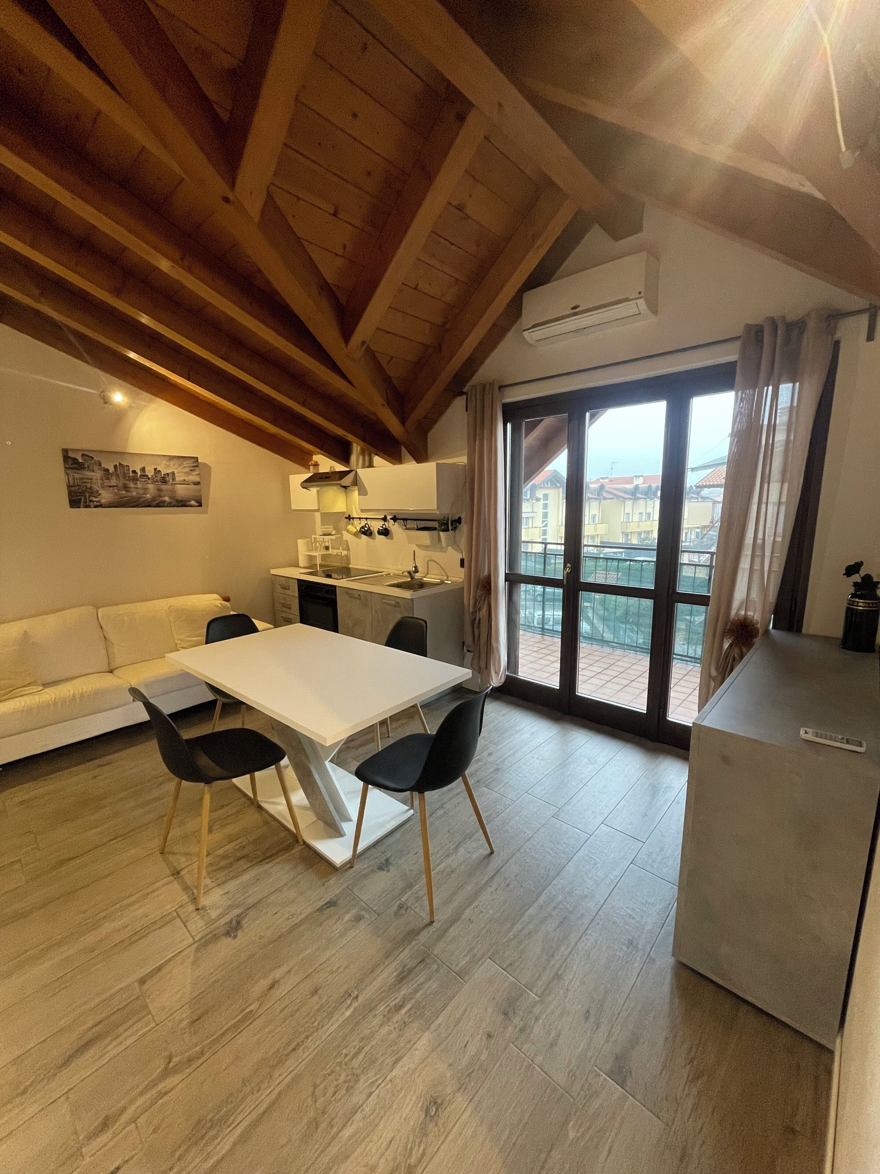 Junior Studio Suite | Living area | 24-inch TV with digital channels