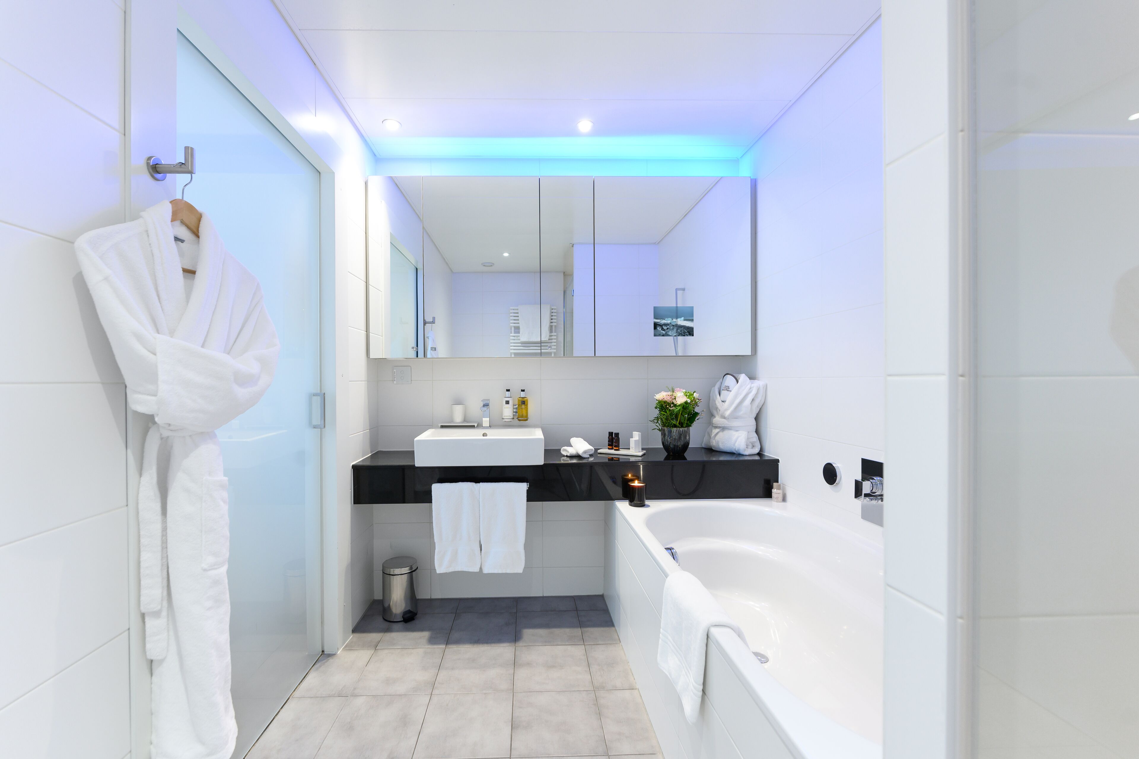 separate bathtub and shower, deep-soaking bathtub, rainfall showerhead