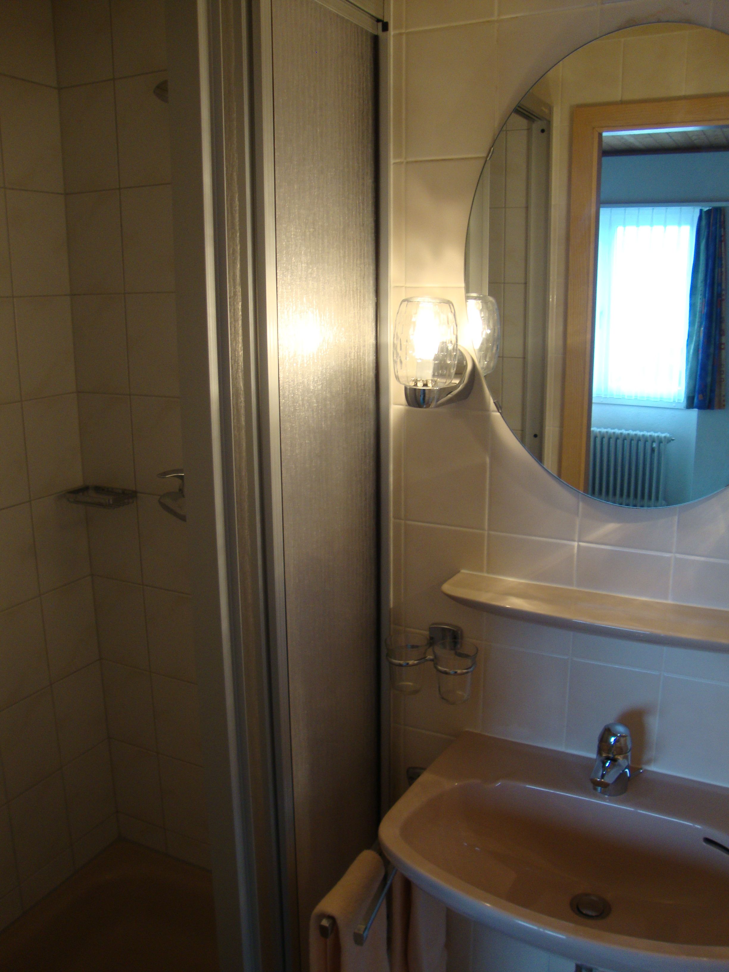 quadruple room | bathroom | shower, free toiletries, hair dryer