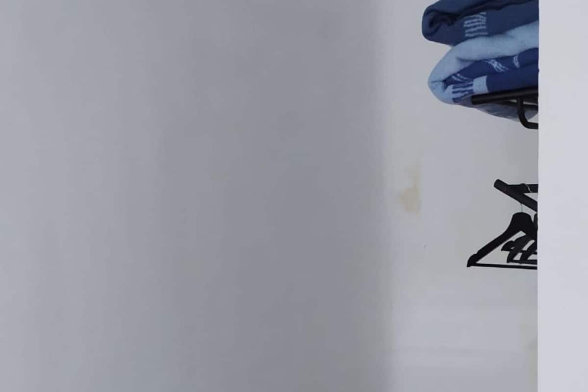 Desk, laptop workspace, bed sheets