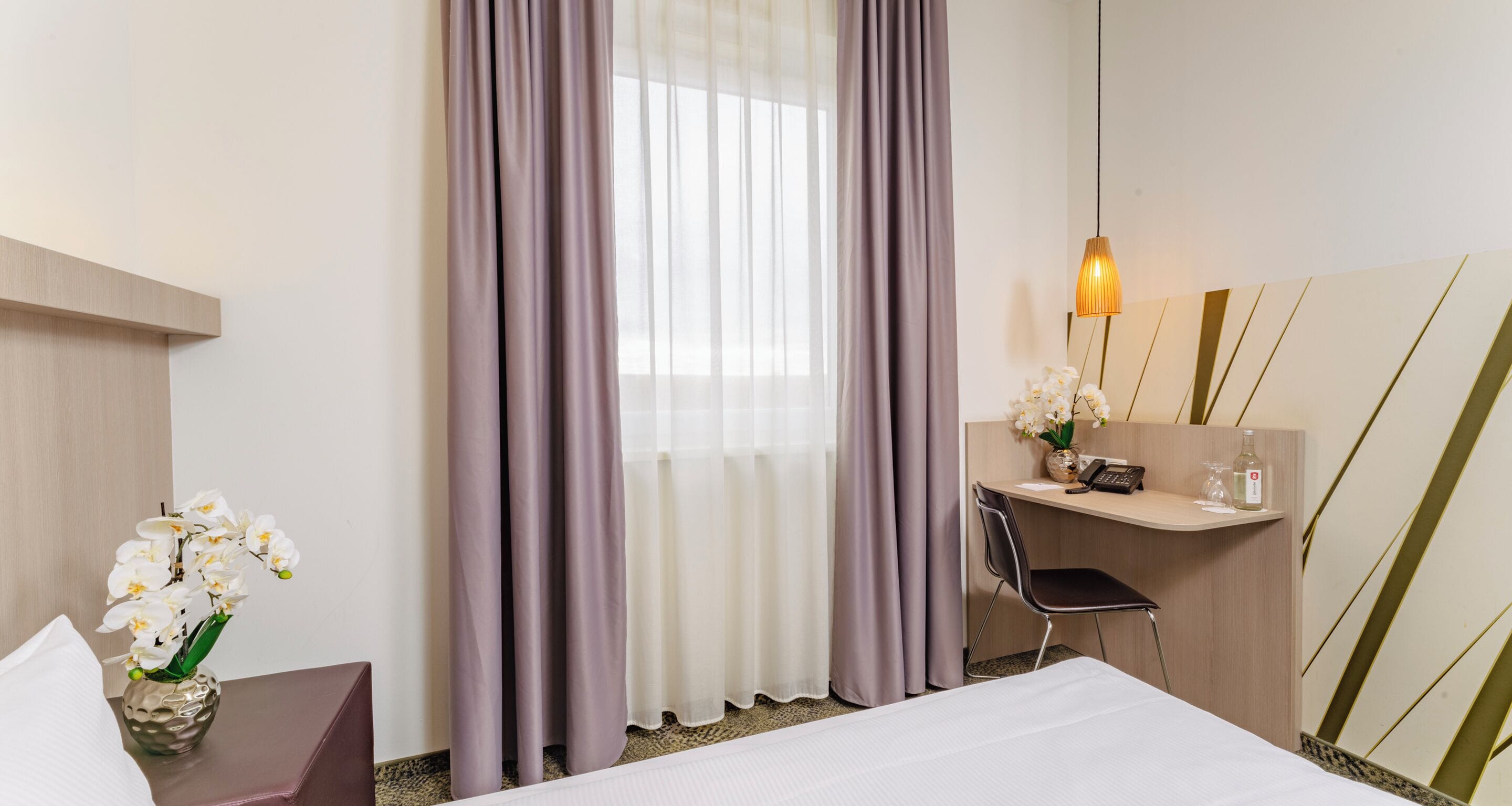 Standard-Einzelzimmer | Pillowtop-Betten, Zimmersafe, Schreibtisch