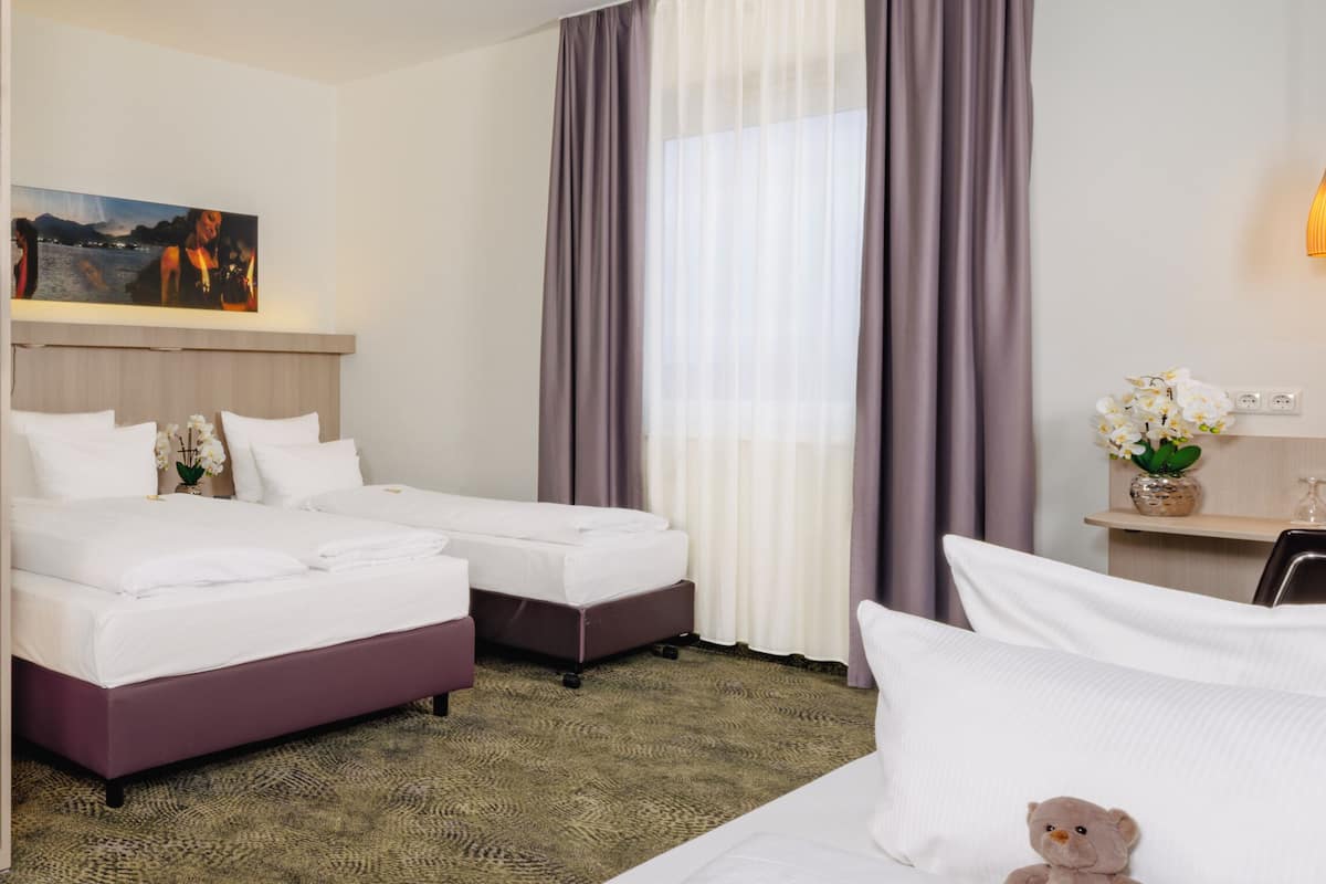 Superior Room, 3 Twin Beds (Cozy Sitting Corner) | 1 bedroom, pillowtop beds, in-room safe, blackout drapes
