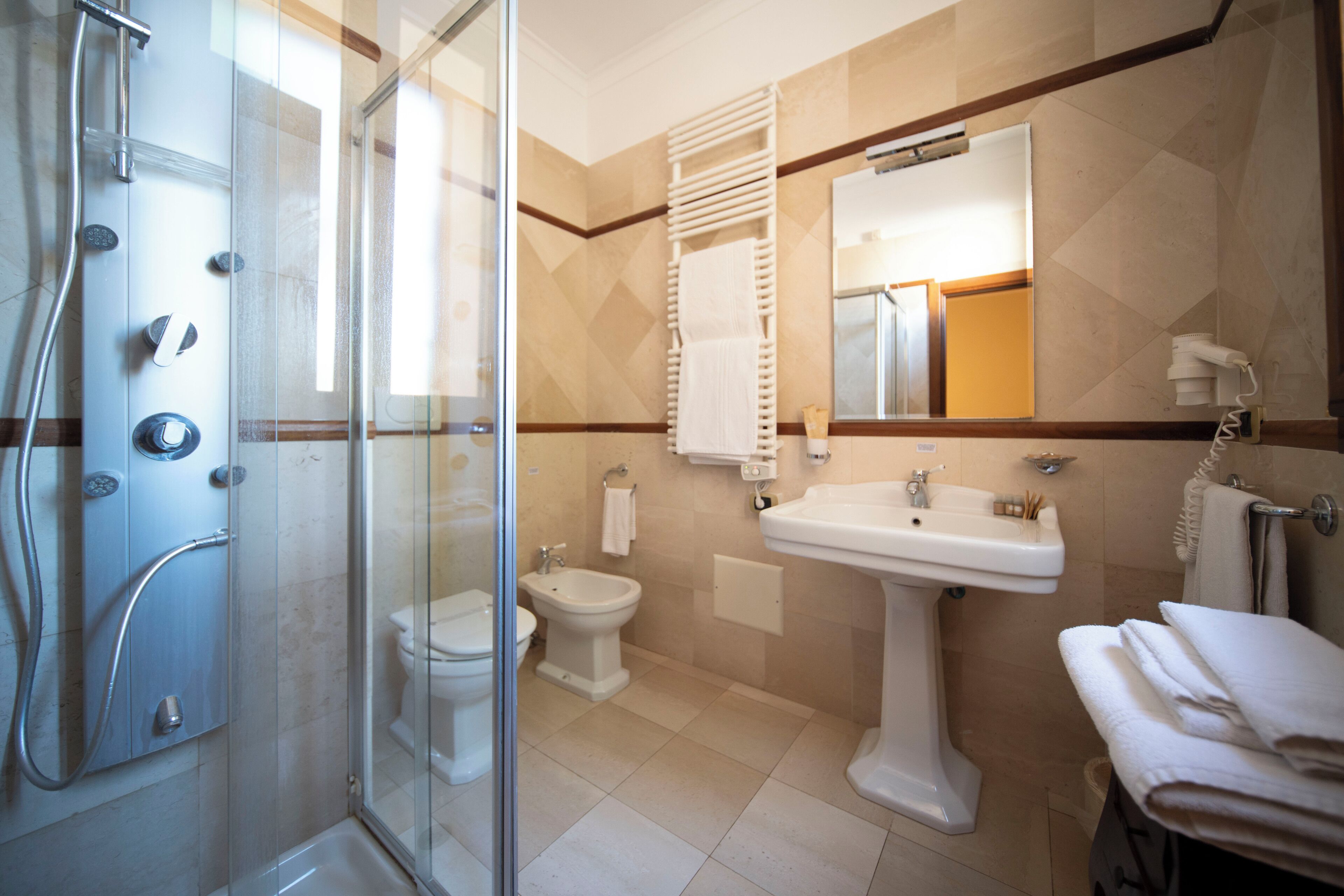 standard double or twin room, garden view | bathroom | free toiletries, hair dryer, slippers, bidet