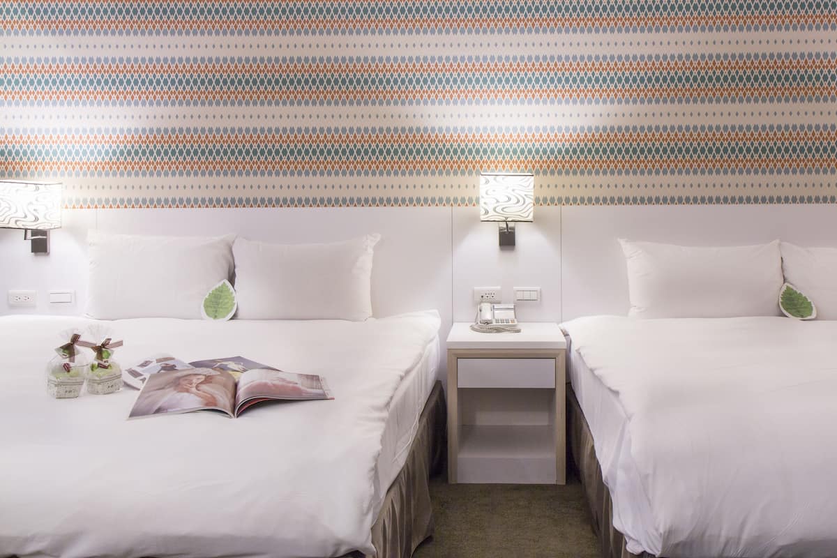 Family Room | Down comforters, free minibar, in-room safe, individually decorated