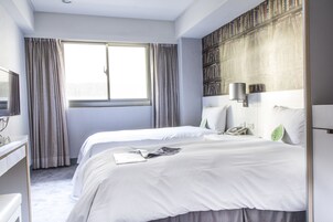 商務客房 | 羽絨被、迷你吧贈品、房內夾萬、獨特設計