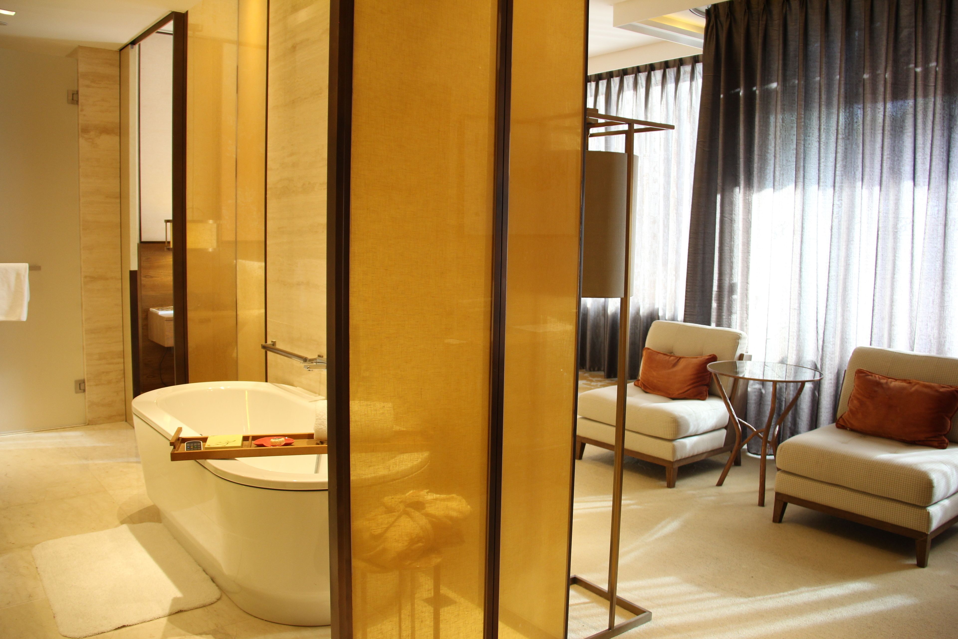 separate bathtub and shower, rainfall showerhead, hair dryer, bathrobes