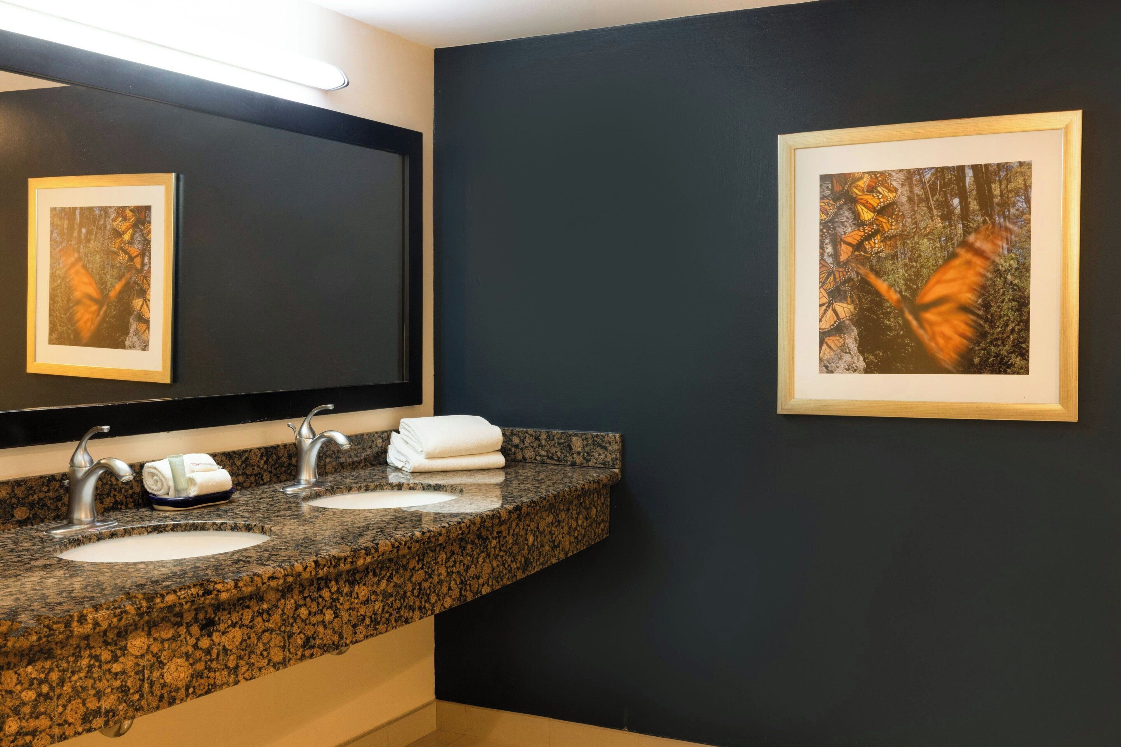 suite, 1 king bed | bathroom | free toiletries, hair dryer, towels