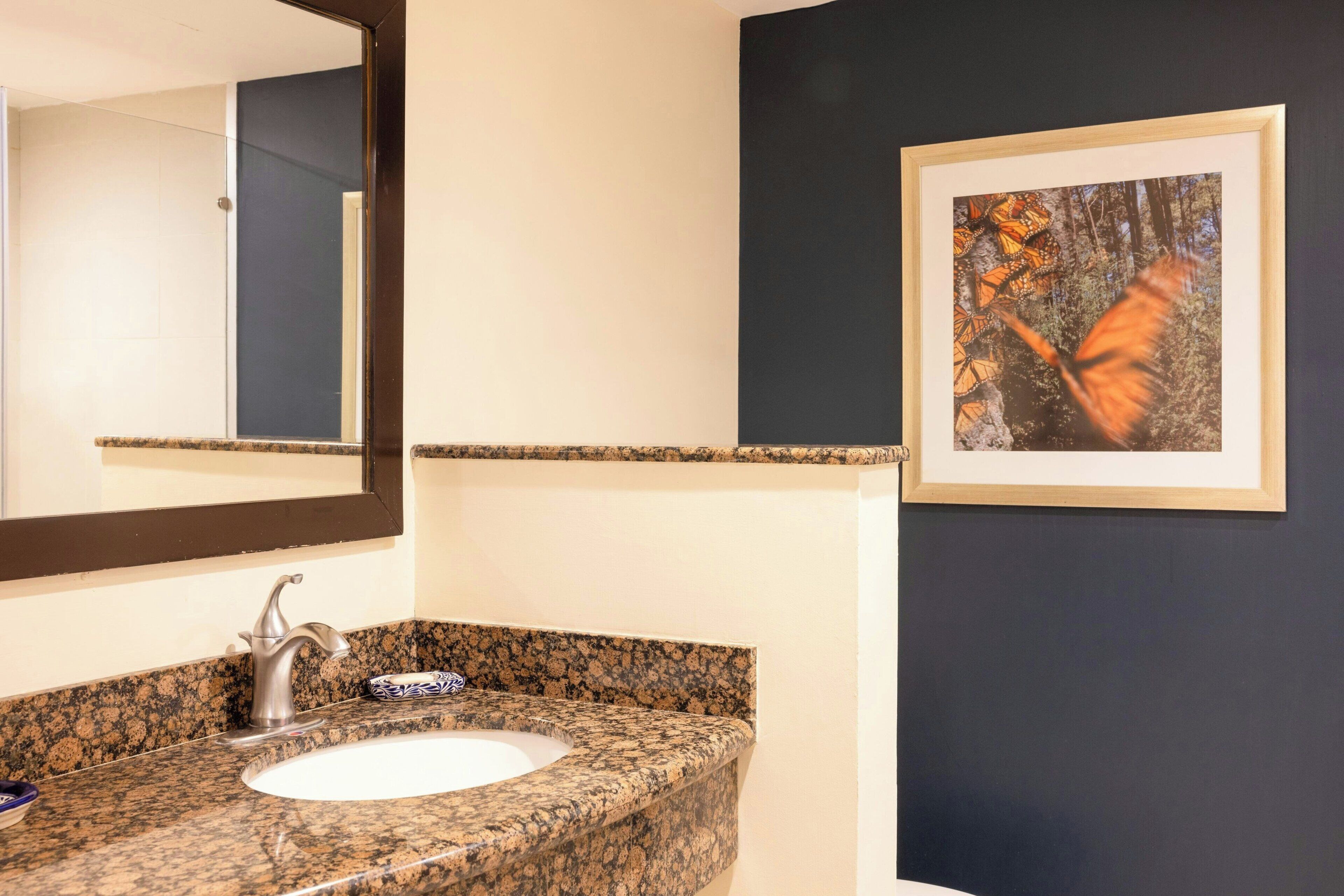 suite, 1 king bed | bathroom | free toiletries, hair dryer, towels