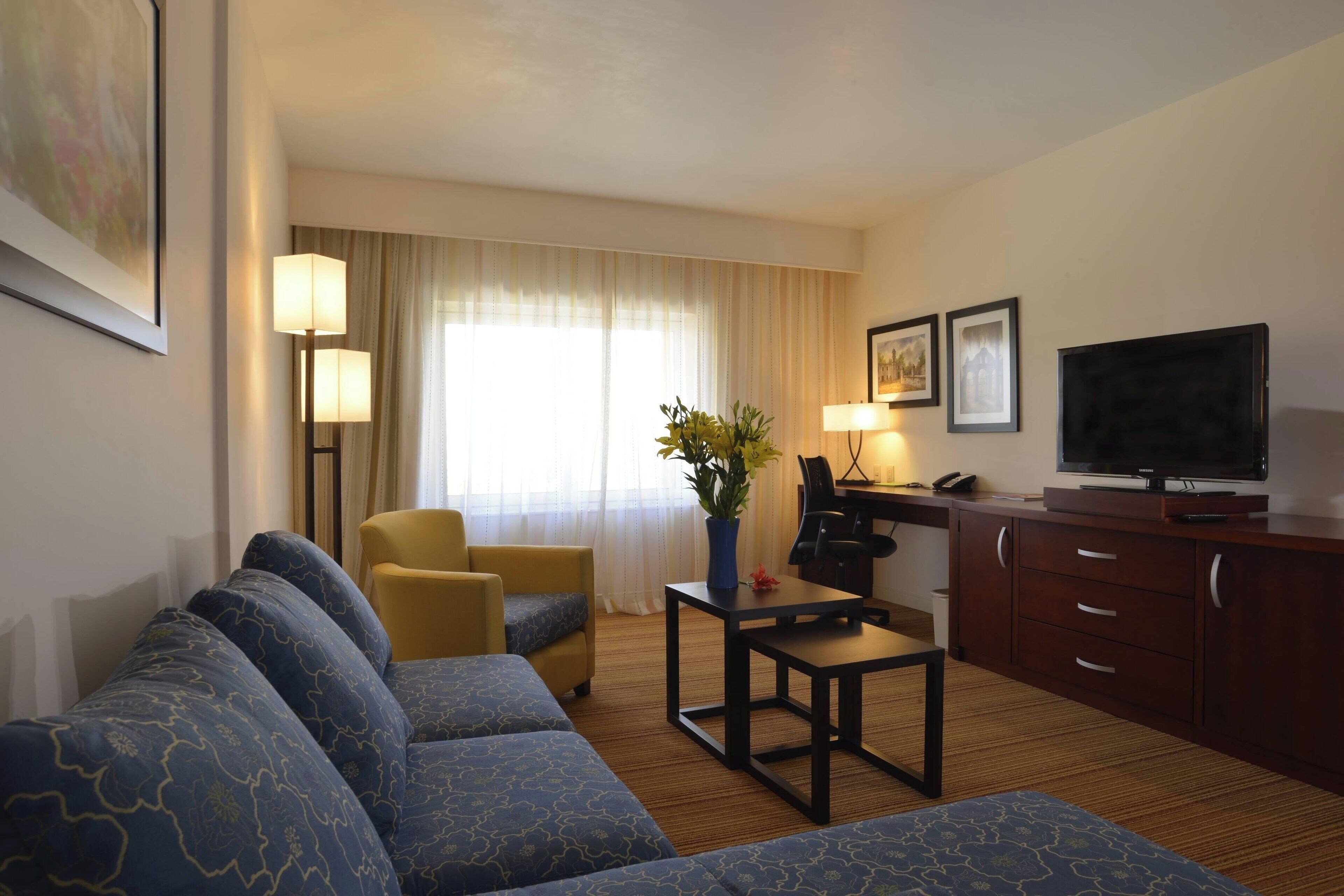 suite, 1 king bed | 1 bedroom, in-room safe, desk, blackout curtains