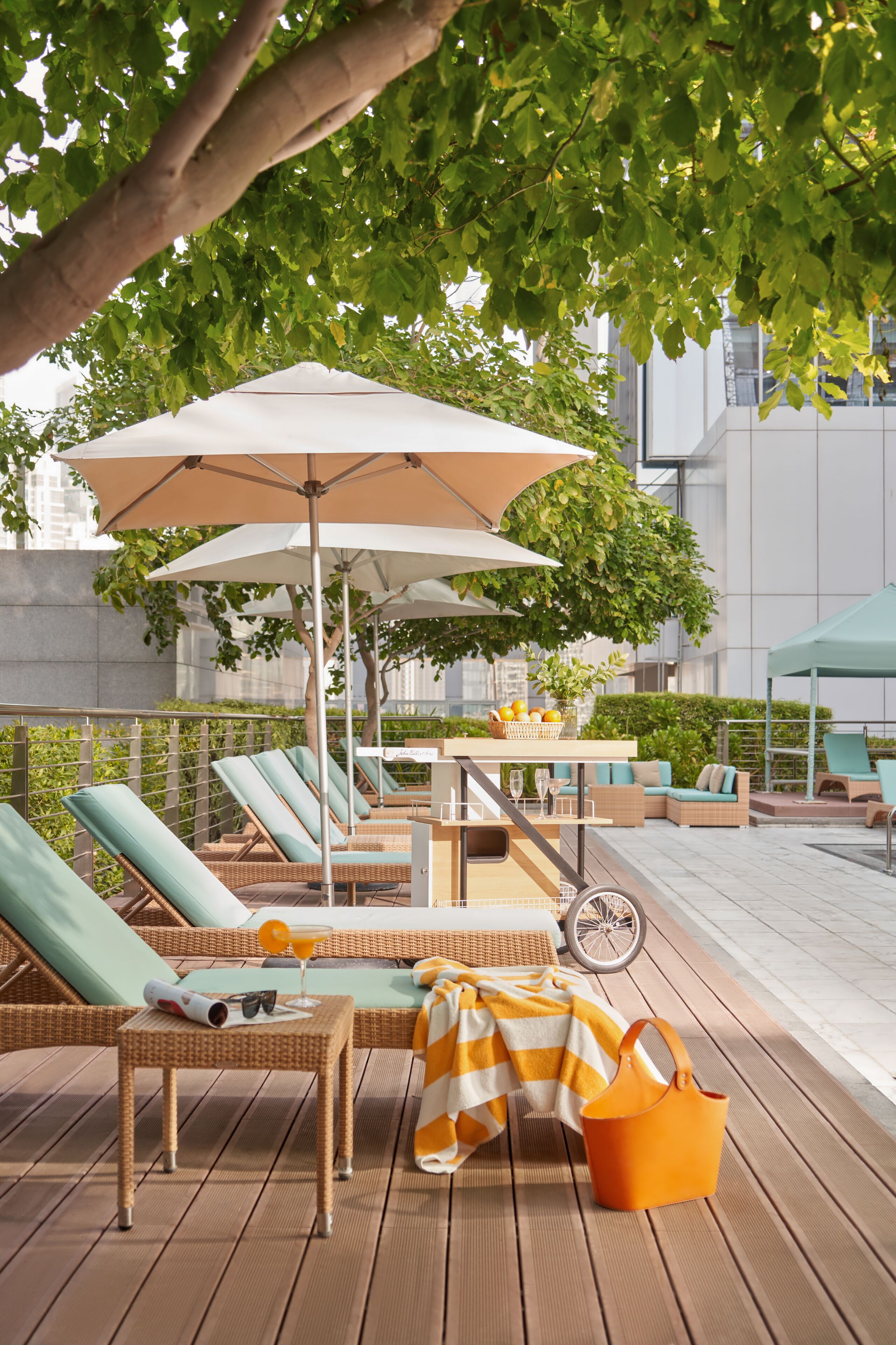 outdoor pool, pool umbrellas, pool loungers