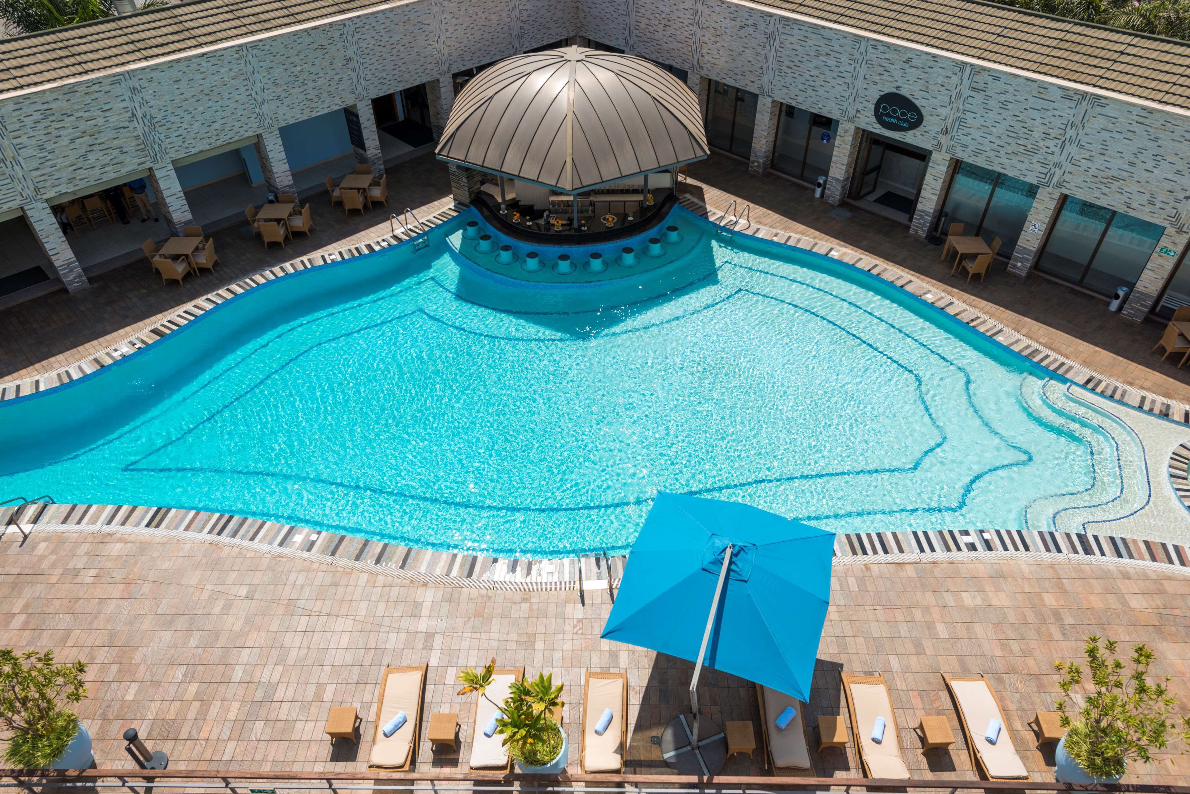 Outdoor pool, free cabanas, pool umbrellas