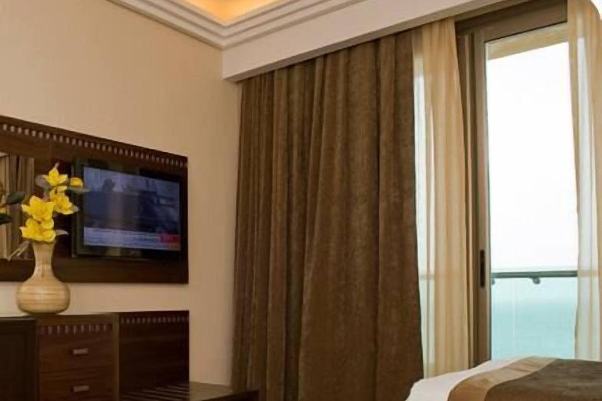 Family Suite, 2 Bedrooms, Balcony, Partial Sea View | In-room safe, cribs/infant beds, high-speed internet