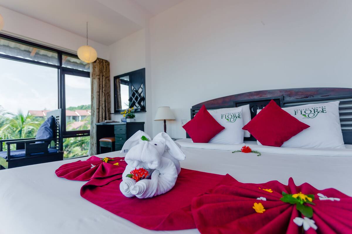 Quarto casal ou duplo luxo, vista para o oceano | Roupas de cama premium, cofres nos quartos, escrivaninha