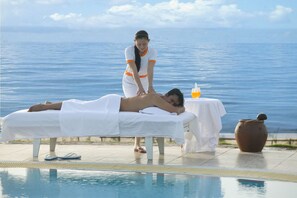 Massage med varma stenar och massage på stranden
