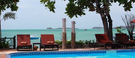 Outdoor pool, pool umbrellas, sun loungers