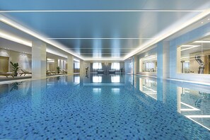 Indoor pool, sun loungers