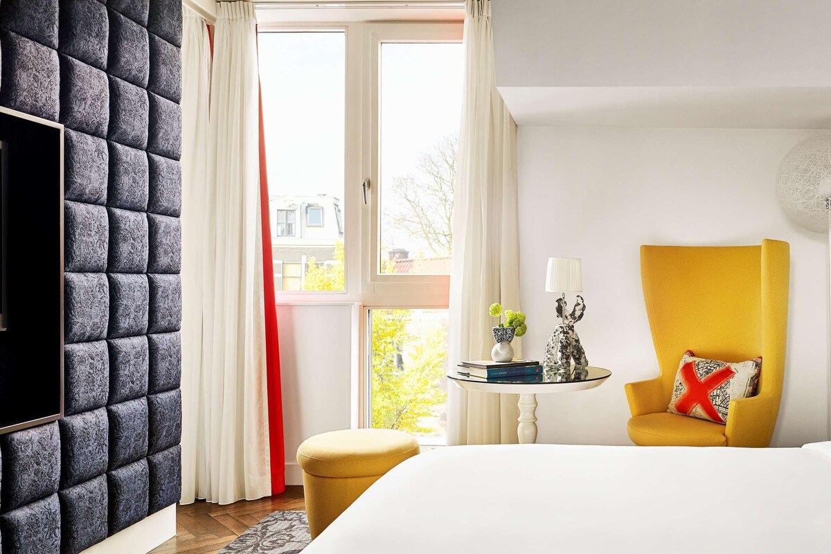 Hypo-allergenic bedding, down duvets, free minibar items, in-room safe