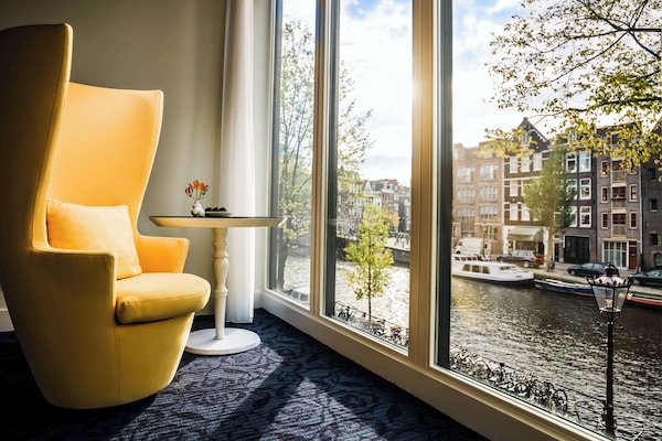 Hypo-allergenic bedding, down duvets, free minibar items, in-room safe