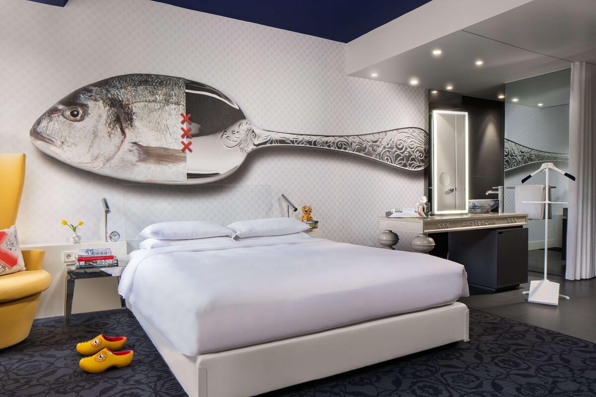 Hypo-allergenic bedding, down duvets, free minibar items, in-room safe