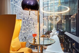 Hypo-allergenic bedding, down duvets, free minibar items, in-room safe