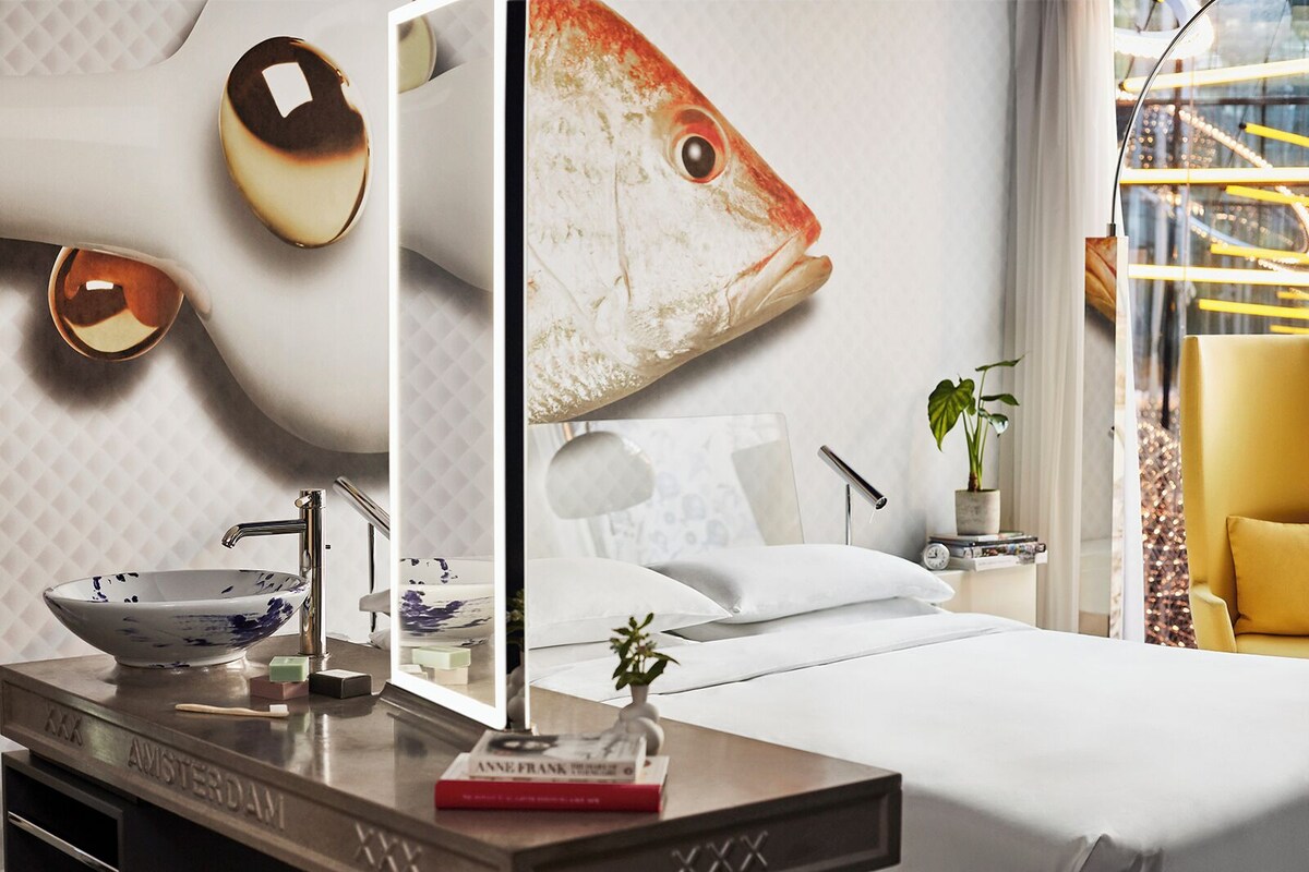 Hypo-allergenic bedding, down duvets, free minibar items, in-room safe