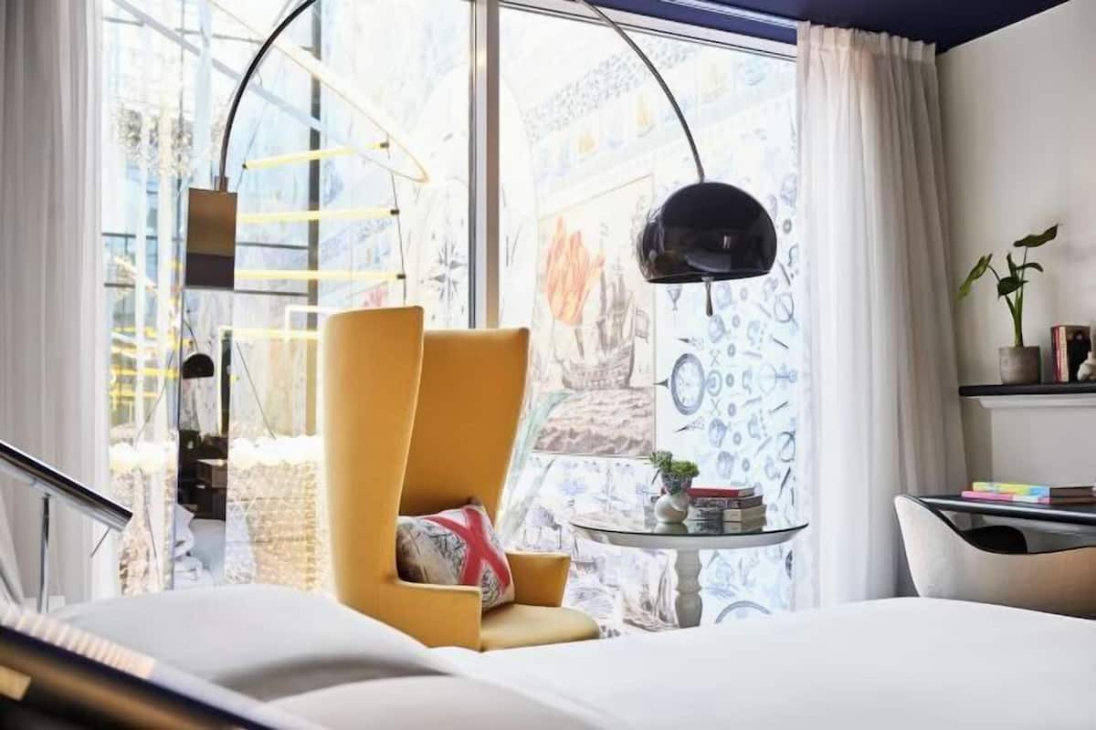Hypo-allergenic bedding, down duvets, free minibar items, in-room safe