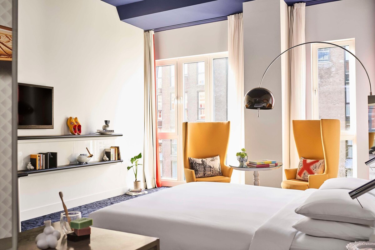 Hypo-allergenic bedding, down duvets, free minibar items, in-room safe
