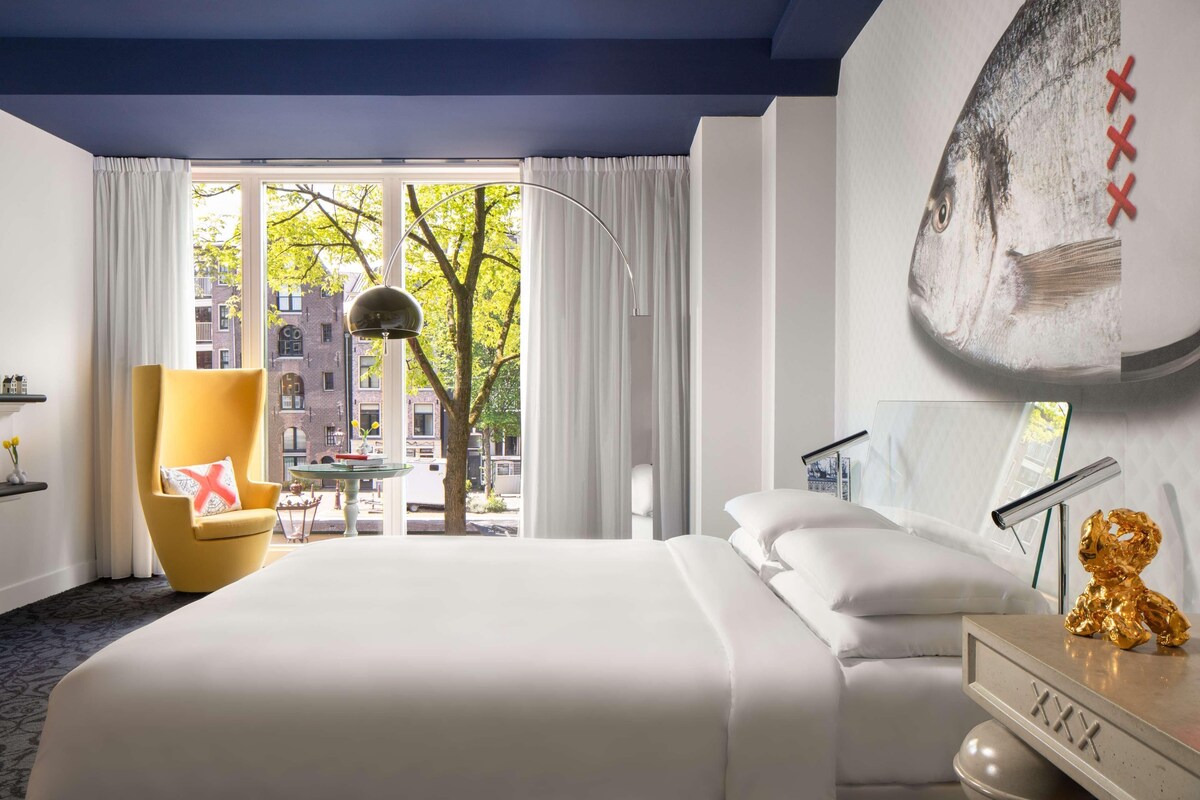 Hypo-allergenic bedding, down duvets, free minibar items, in-room safe