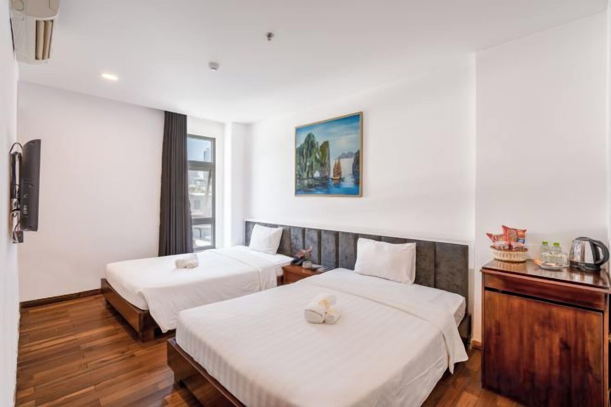 Donzen dekbedden, bedden met traagschuimmatras, een minibar