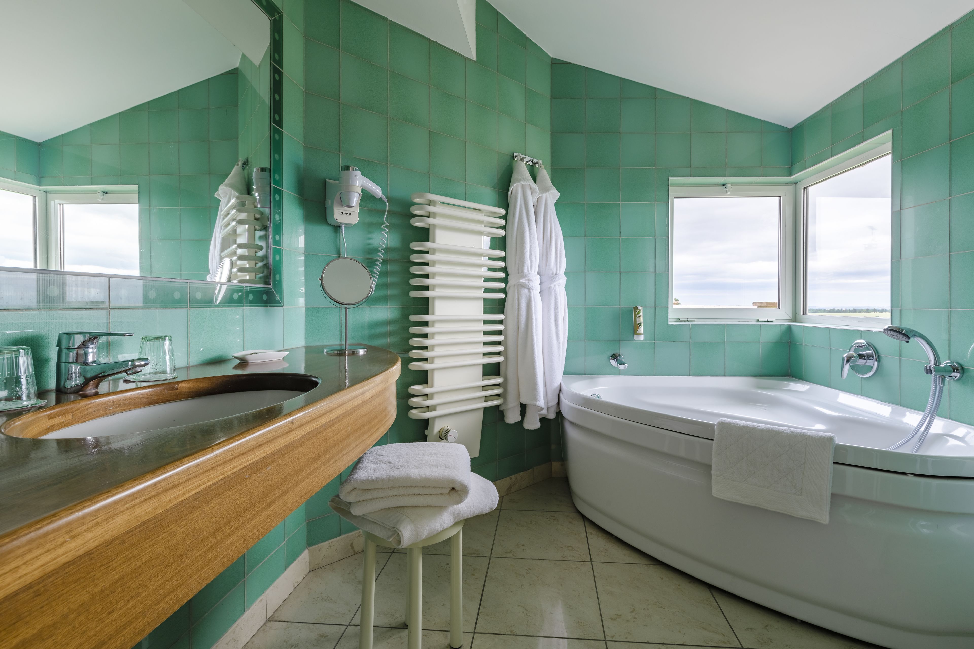 family room, 1 king bed with sofa bed | bathroom | designer toiletries, hair dryer, bathrobes, towels