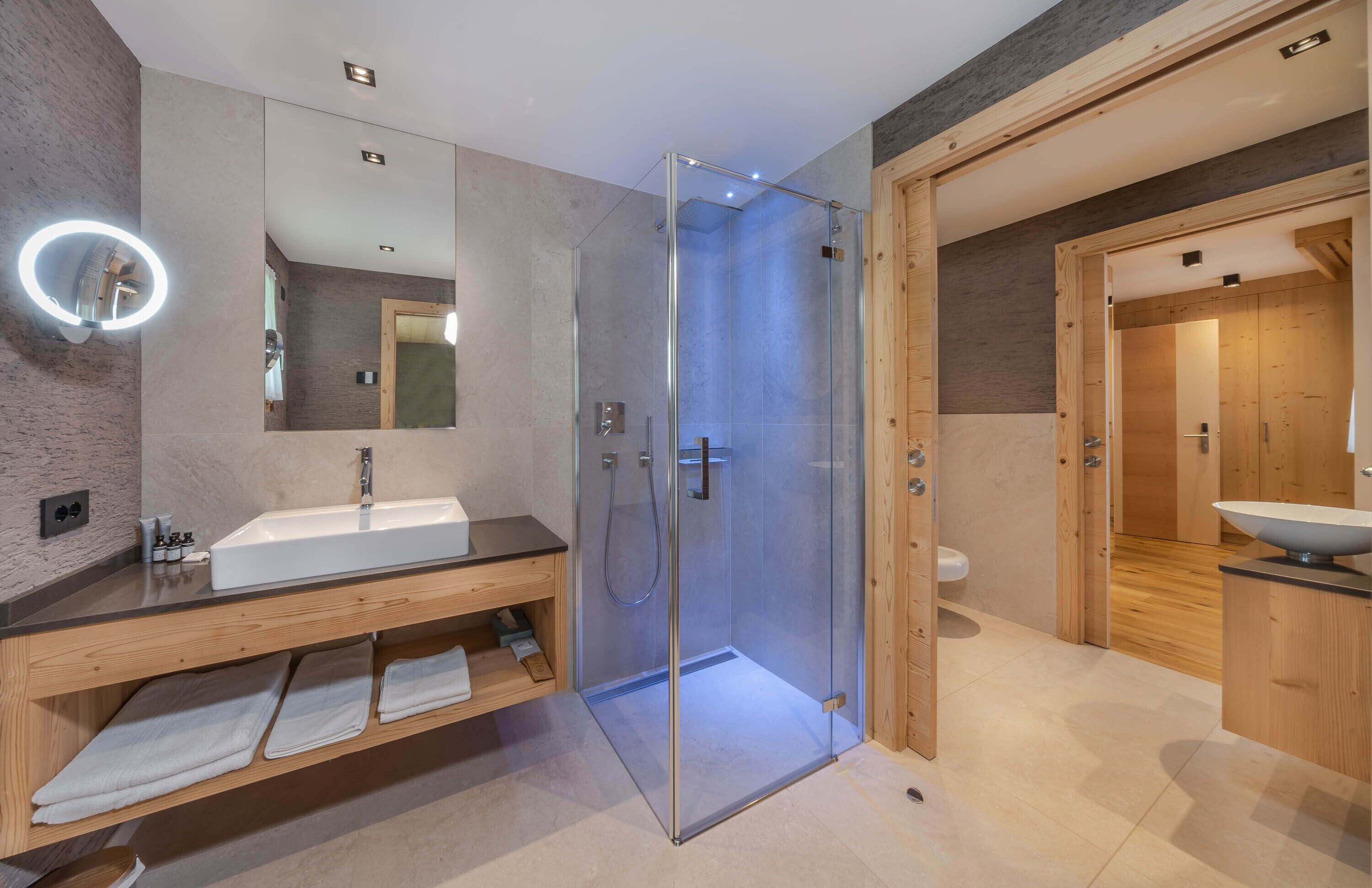 family room, 1 king bed with sofa bed, mountain view | bathroom | shower, free toiletries, hair dryer, bathrobes