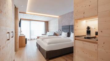 Premium bedding, down duvets, pillow-top beds, in-room safe