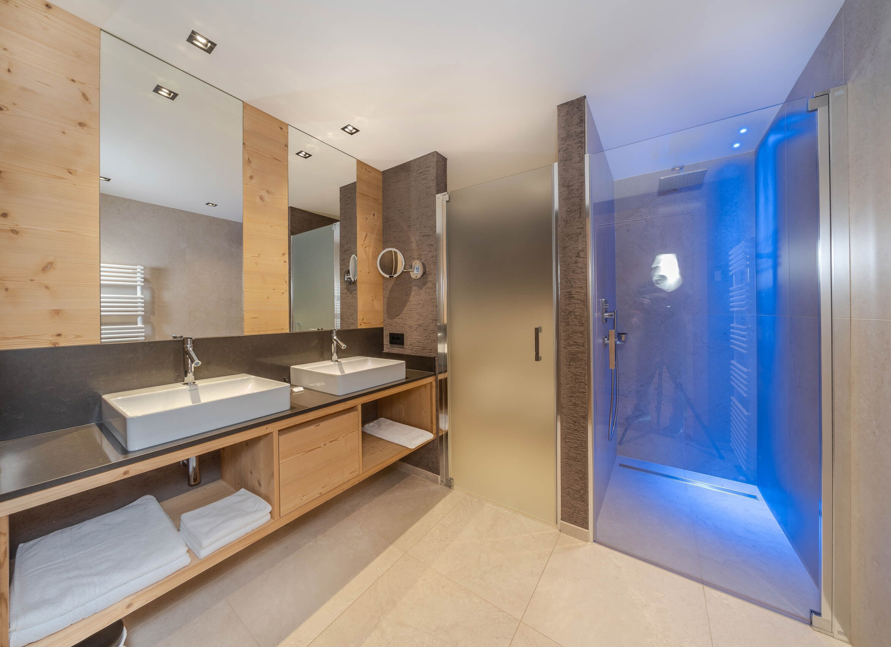 family suite, 1 king bed with sofa bed, mountain view | bathroom | shower, free toiletries, hair dryer, bathrobes