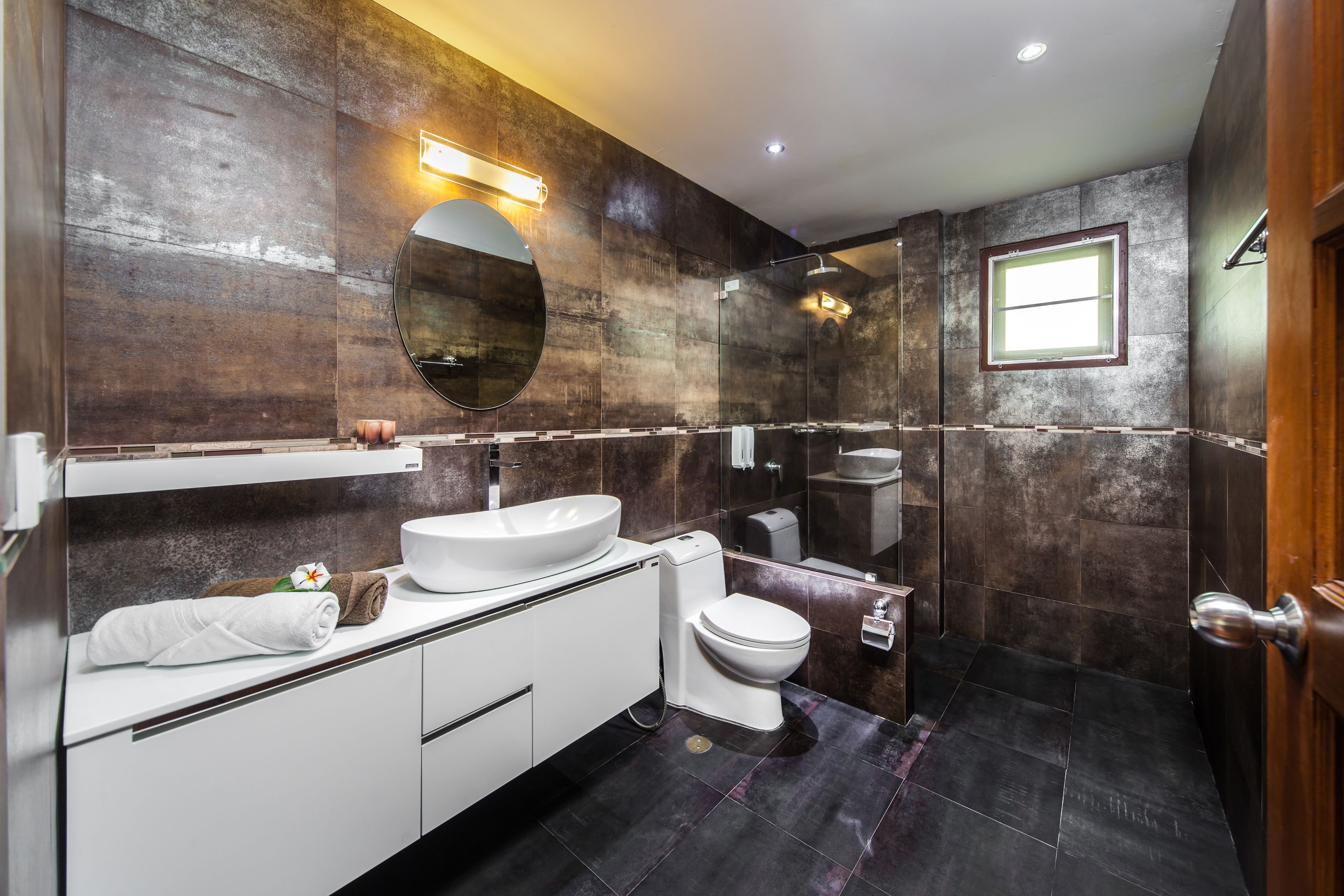 rainfall showerhead, designer toiletries, hair dryer, dressing gowns